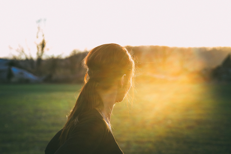 Woman feeling calm and relaxed in natural light