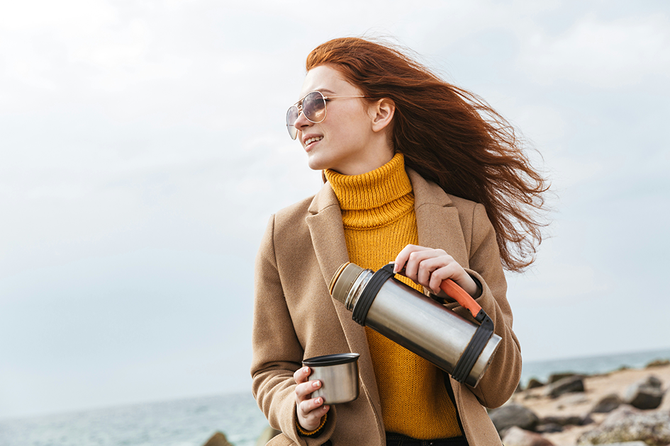 Woman practicing healthy daily habits outdoors to support wellness and balance naturally