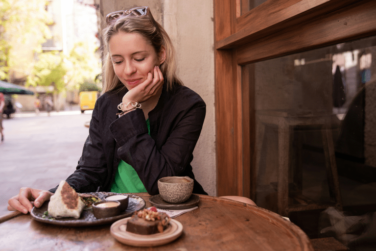 Woman feeling full after eating only a few bites