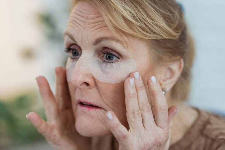 Woman starting retinol after 40 as part of a gentle evening skincare routine